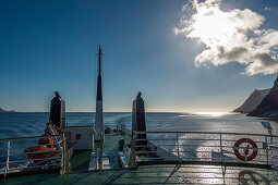 low sun on deck of the ferry from Andenes to Gryllefjord, Senja, Norway