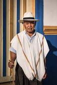 portrait of old man  with stick and hat in front of colonial house, Salento, UNESCO World Heritage Coffee Triangle, Departmento Quindio, Colombia, Southamerica