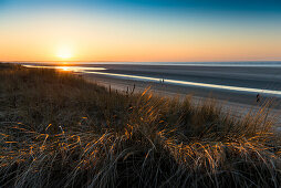 sunset the beach  in winter, East Frisian Islands, Spiekeroog, Lower Saxony, North Sea, Germany