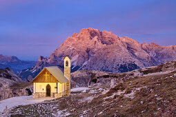 Illuminated chapel in front of Monte Cristallo, Sexten Dolomites, Dolomites, UNESCO World Heritage Site Dolomites, Venetia, Italy