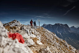 Two Hikers on the way to the top of Daniel Mountain, Daniel mountain, Ammergau Alps, Tyrol, Austria