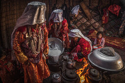 Kyrgyz women are cooking in yurt, Afghanistan, Asia