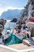 Boat transfer to Marina Piccola from the Fontelina bath on Capri, Capri Island, Gulf of Naples, Italy