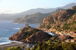 Porto with medieval tower and beach on the Gulf of Porto, western Corsica, France