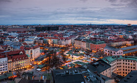 Over the rooftops of Munich at sunset, view from above of Viktualienmarkt