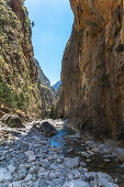 Imposing rock faces on hike in Samaria Gorge, West Crete, Greece