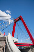 Red pylon and rope ties of the Willemsbrücke, Rotterdam, Holland