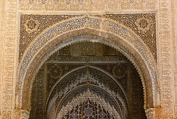 Moorish ornate arches in the interior of the Alhambra, Granada, Andalusia, Spain