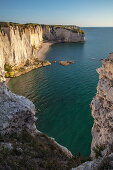 Chalk cliffs cliff at the golden hour near Étretat, Normandy, France.