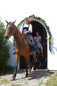 More than 300 horses take part in the Willibaldsritt in Jesenwang. The ride through the church is unique in Europe, Jesenwang, Upper Bavaria, Bavaria, Germany