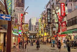 Street scene in the Ueno Ameya-Yokocho district at sunset, Tokyo, Japan