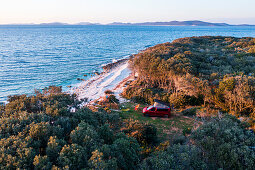 Road trip Croatia, in the evening with the camper on the coast