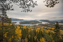 Landscape panorama with islands of Höga Kusten at the lookout point Rödklitten in the east of Sweden in autumn