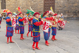 Participants in Calcio Storico Fiorentino festival on parade, Piazza della Signoria, Florence, Tuscany, Italy