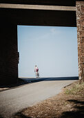 Road biking, woman riding a racing bike on the road