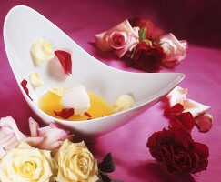 Champagne soup with ice cream and rose petals