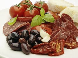 Italian antipasti (salami, olives, tomatoes)