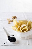 Pasta, black lentils and walnuts