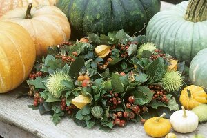 Wreath with rose hips, pumpkins