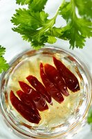 Pickled red chillies and fresh coriander leaves