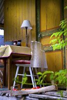 Table and chair outside summer house