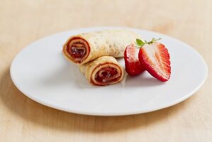 Pancakes filled with strawberry jam