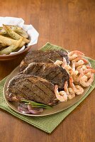 Surf and Turf; Grilled Angus Steaks with Shrimp on a Platter