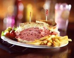 Reuben Sandwich Halved with French Fries