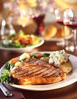 Grilled T-Bone Steak with Baked Potato and Veggies