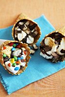Three S'mores Ice Cream Cones with Assorted Toppings