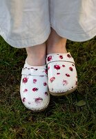 A child wearing clogs