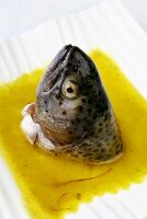 Bouillabaisse with trout head (fish soup, France)