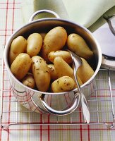 New potatoes with caraway in pan