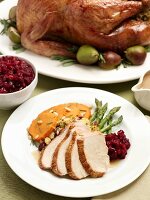 Sliced Turkey with Cranberries, Yams, Asparagus and Stuffing