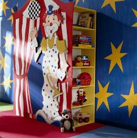 Children's room with clown drawn on shelf