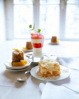 Nut tart, marzipan cream and tiramisu on plate