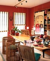 Asian-style dining area with teak chairs and beech wood table