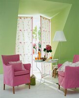 Room with pastel wall, furniture and double door with floral pattern