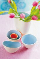 Ceramic glazed coloured bowls with flower