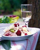 Cherry risotto with parmesan cheese in dish