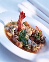 Close-up of fish stew cacciucco with liguria on plate