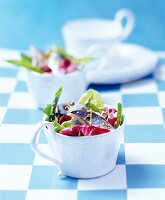Green salad with herring and a lemon dressing