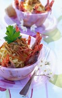 Noodle and scampi fish salad in bowl for picnic