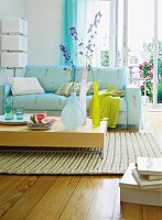 Living room with white sofa and slipcover from transparent organza