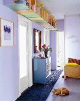 Interiors of purple painted room with fur carpet