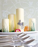 Pillar candles with Easter decorations