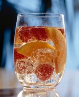 Raspberries and papaya punch in glass