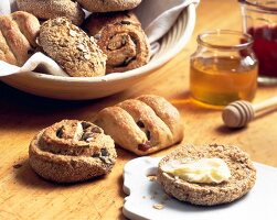 Freshly baked bread rolls with butter