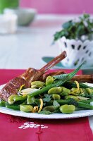 Roasted lamb's leg with herbs and beans salad