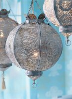 Close-up of oriental lanterns made of perforated tinplate